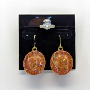 Fused glass earrings.  Muted orange with flecks of multi colors.