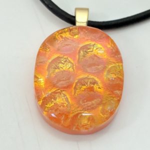 Fused glass pendant, beautiful multi colors. Photos don't do it justice