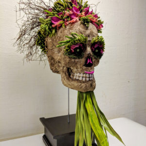 Handmade decorated skull on display base